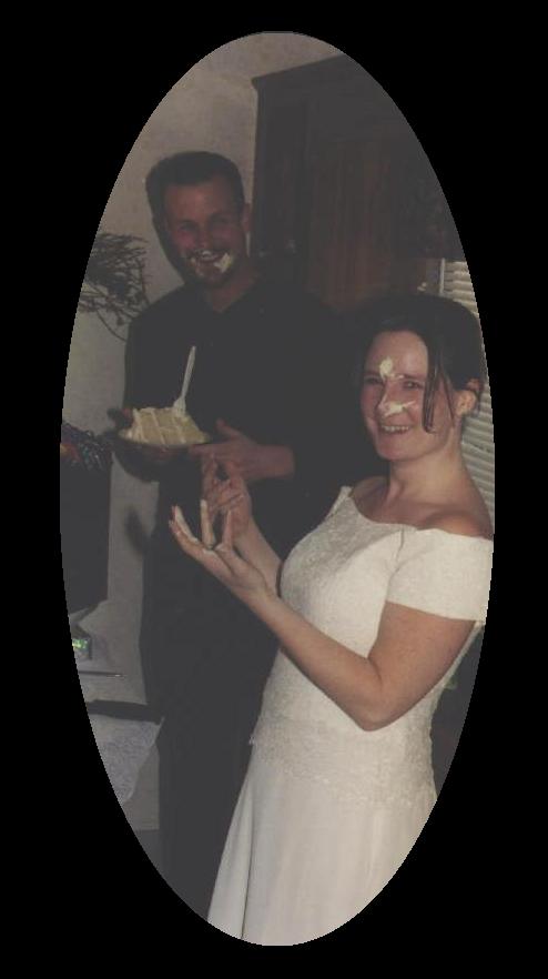 Feeding each other some cake.